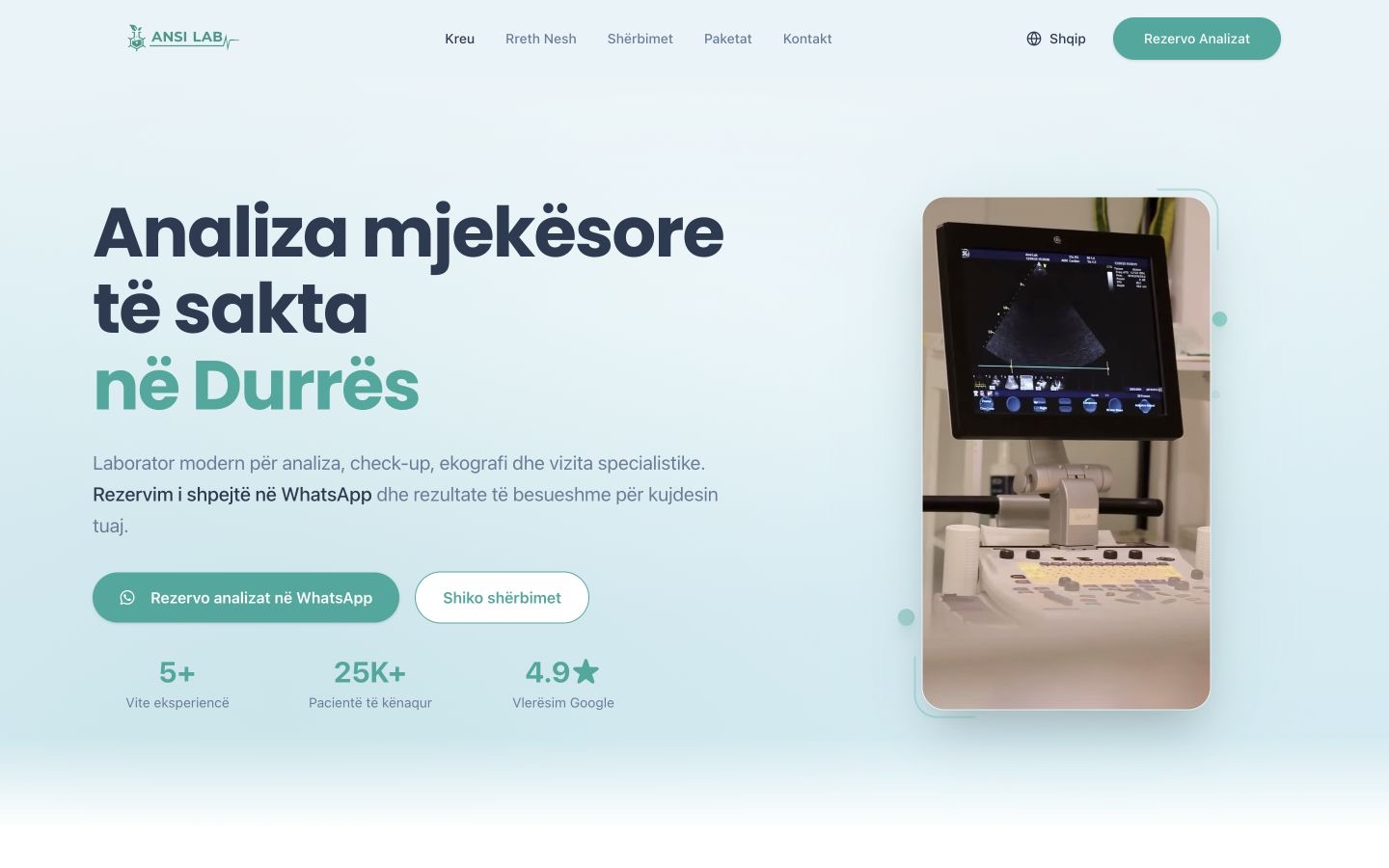 AnsiLab medical laboratory website homepage with WhatsApp booking